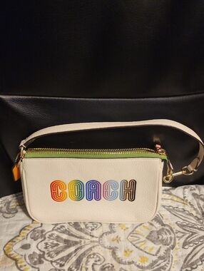Coach Nolita Cream Leather Rainbow Logo Wristlet